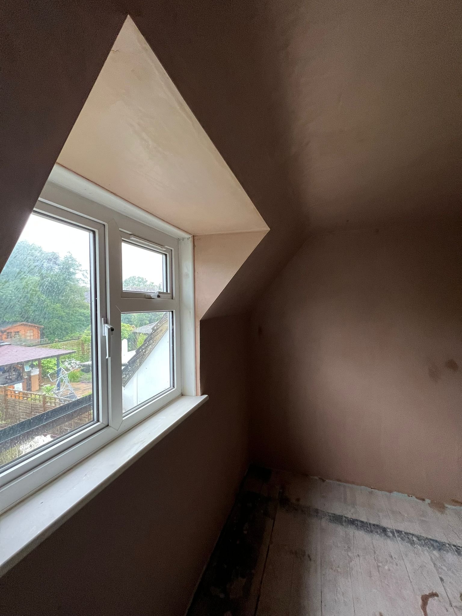 Plastered window reveal and wall finish in Bristol home