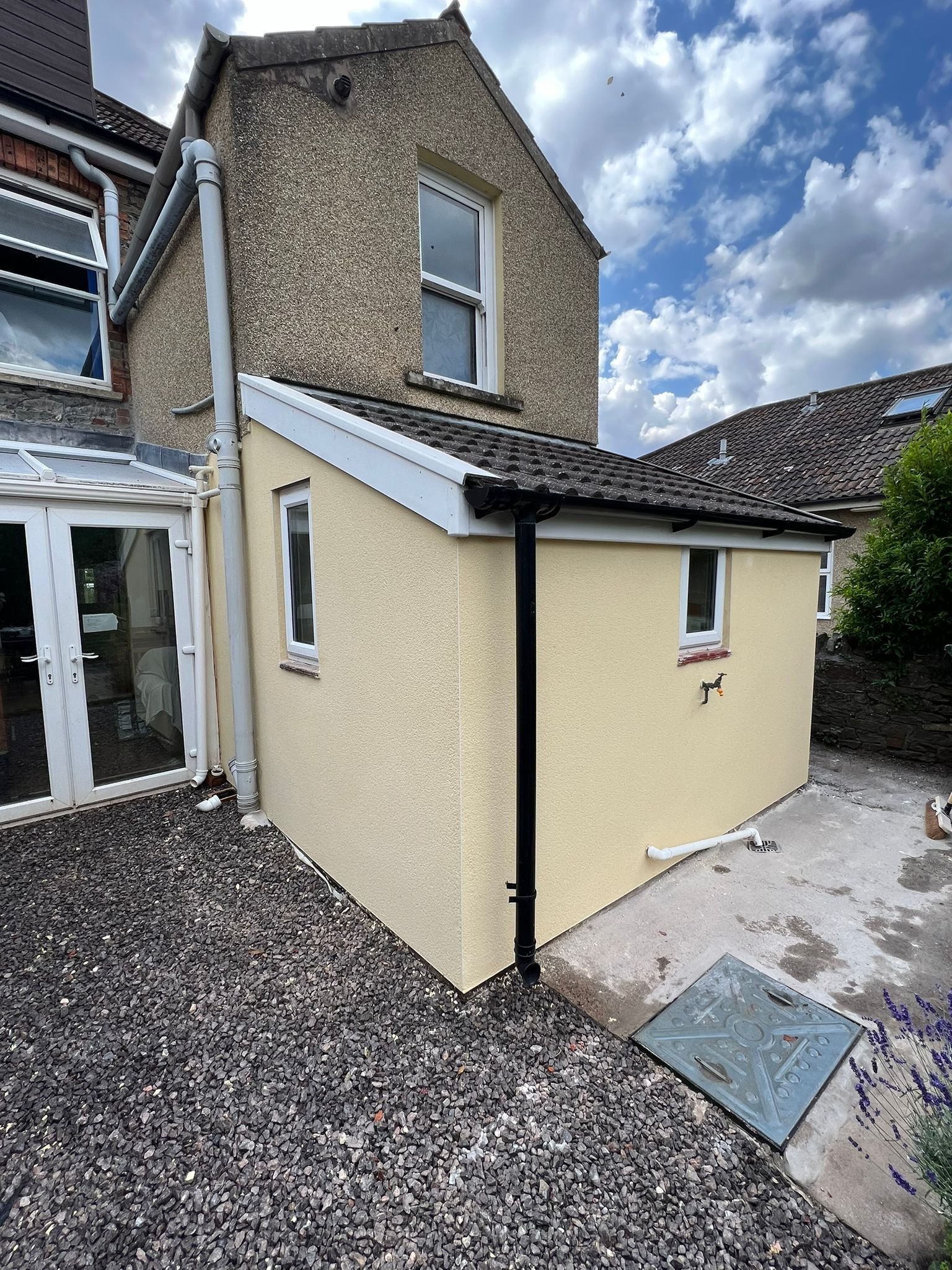 Coloured render finish on residential property in Bristol